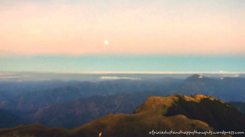 During sunrise, the moon was still present at the other side of the summit.